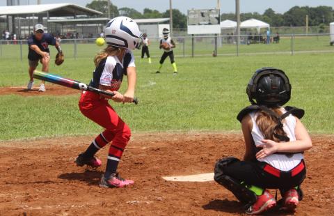 Alyssa Quibodeaux awaits a pitch in a game in the PONY Regionals Tournament played in Eunice. Quibodeaux’s 8U team from Ville Platte claimed the title and will now play in the World Series in Youngsville. (Gazette photo by Rhett Manuel)