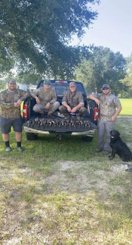 Pictured in no particular order are Sam Tuminaro, Seth Manuel, Steven Aguillard, and James Veillon with their dog, Callie, on the opening weekend of teal season this year. (Photo courtesy of Sam Tuminaro)