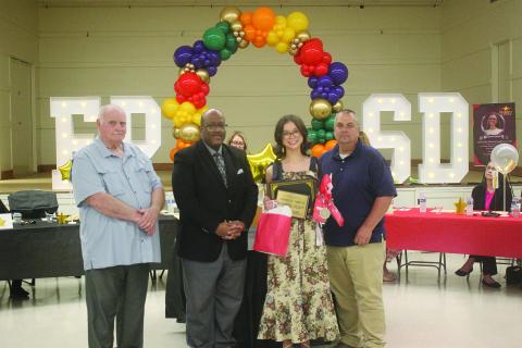 L-R: School Board President Bobby Hamlin, Superintendent Darwan Lazard, Charlee Smith, and Basile High School Principal Tony Bertrand. (Gazette photo by Tony Marks)