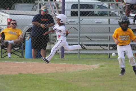 Amari Carr (9) trots around the bases and approaches home plate after hitting a home run in Ville Platte East’s 21-5 win over Oakdale to begin the East Sub-District Tournament. Carr and the rest of the T-Ball All-Stars from Ville Platte will now compete in the Dixie Youth District 7 Tournament here in Ville Platte beginning Thursday, June 23. (Gazette photo by Tony Marks)