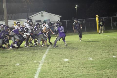 The Ville Platte defense led by Jakailon Fontenot (16) and Brandon Freeman (13) attempt a goal line stop as the Bulldogs hosted Northwood-Lena in their first action of the season. (Gazette photo by Rhett Manuel)