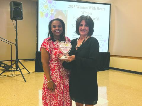 DAVID NAMED WOMAN WITH HEART - Evangeline Parish nominee Nina David (right) was named the as the Evangeline Parish recipient of the 2025 St. Landry-United Way Women with Heart. She is shown with presenter Angela Cassimere. (Gazette photo by Heather Bogard)