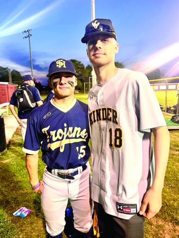 ATHLETES MEET – Blake Hebert (left) and Will Fontenot (right) met at a game recently. Hebert is a survivor of cancer, and Fontenot has been battling it. Hebert shared some faith and hope with Fontenot as he told him to never give up. (LSN photo by Jessica Richard)