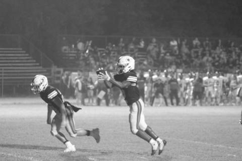 Elijah George (2) takes a direct snap at the quarterback position in Pine Prairie’s 58-13 loss to Church Point to open district play. (Gazette photo by Rhett Manuel)