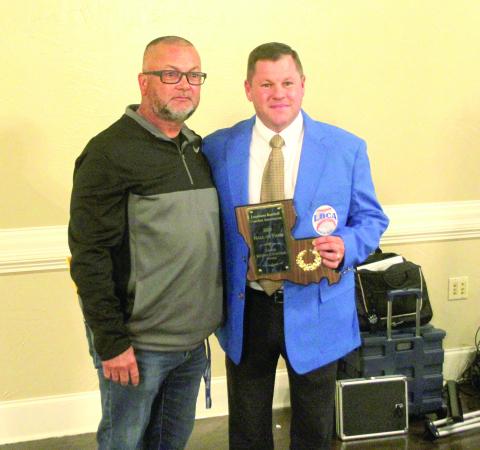 Kenney Courville (right) was inducted into the Louisiana Baseball Coaches Association Hall of Fame on Friday, January 13. Courville was introduced by current Kinder baseball coach Rick Whittington (left). (LSN photo by Tony Marks)