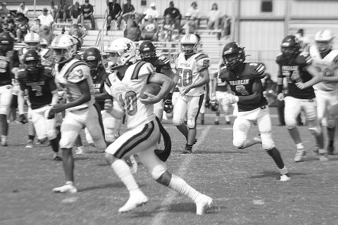 Pine Prairie quarterback Cayden McCollough (10) finds room to run in the Panthers’ game at Oberlin Saturday morning. McCollough, unofficially, ran for 100 yards on eight carries and scored a touchdown. (LSN photo by Tony Marks)