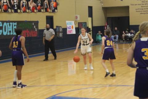 Taylor Darbonne (34) takes the basketball down the court in Sacred Heart’s home win against Opelousas Catholic. (Gazette photo by Rhett Manuel)