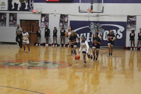Vandryua Wilson (22) drives down the court for the Ville Platte High Lady Bulldogs in their playoff loss to Baker, 58-53, at home Thursday night. (Gazette photo by Rhett Manuel)
