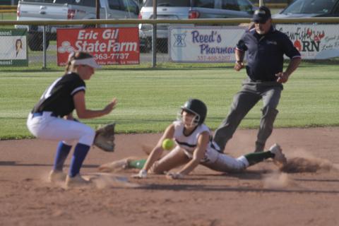 Kylie Rider (22) slides safely into the second base bag after leading off the game with a single. She later scored Mamou’s first run of the Lady Green Demons’ 8-3 win over Erath in the Class 3A playoffs. The team now plays Buckeye today at 6 p.m. (Gazette photo by Tony Marks)