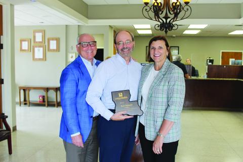 From left are John D’Angelo, Investar CEO/president; Kent Fontenot, Mamou branch manager; and Ginger Laurent, Louisiana Bankers Association chief executive officer. (Gazette photo by Kathy Longino)