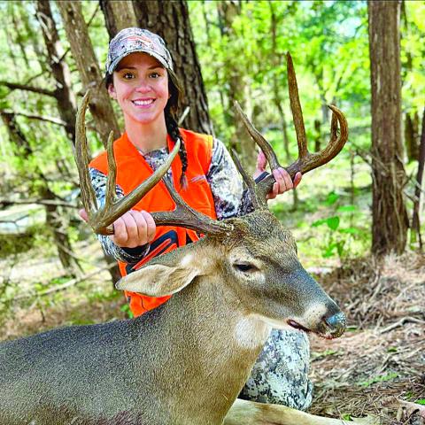 Lacy LaGrange, former head softball coach at Mamou High School, is pictured with a buck she killed on a recent hunting trip. (Photo submitted)