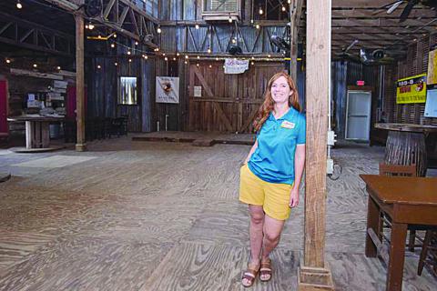 Co-owner Bonnie Kyzar stands inside The Barn Dancehall and Pavilion at Lakeview Park and Beach, outside of Eunice, on Thursday, May 14. Many of the activities of Balfa Week, Grand Hoorah and Black Pot Music Camp are held here. (Advocate photo by Robin May)