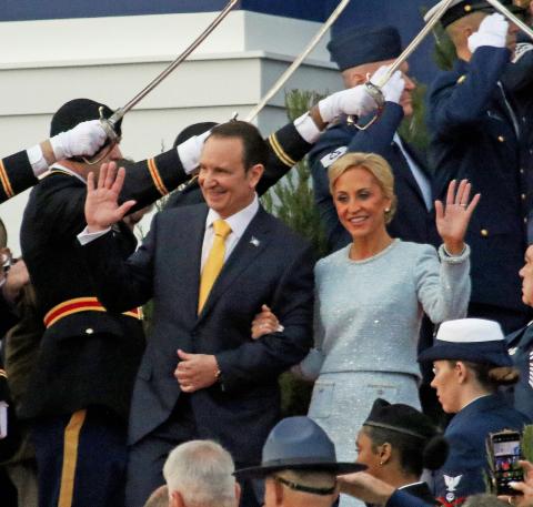 Gov.-elect Jeff Landry and his wife, Sharon, walk down the steps of the state capitol on Sunday during the inauguration ceremony. (LSN photo by Harlan Kirgan)