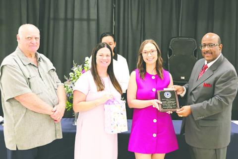 (L-R) Bobby Hamlin, president of the Evangeline Parish School Board; Candace Manuel, principal of Vidrine Elementary; Lauren Thibodeaux, elementary teacher of the year; and Darwan Lazard, superintendent.