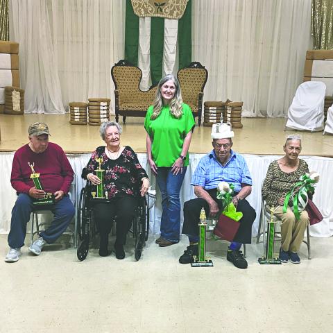 LE ROI ET LA REINE CROWNED - Shown, from left, are runners-up Byron Faul and Janella Soileau, Louisiana Cotton Festival Association President Kimberly McDaniel, Le Roi James Bordelon and La Reine Susan Graser. (Photo courtesy of Heritage Manor)