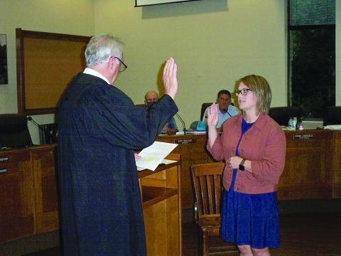 Evangeline Parish District Judge Gary Ortego (left) administers the oath of office to newly appointed Evangeline Parish Police Juror Leila Johnson Thrasher (right). Thrasher replaces her father, the late Lamar Johnson, on the jury representing District 4. (Gazette photo by Tony Marks)