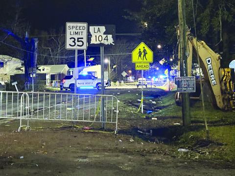 Pictured is the police presence near the intersection of 6th Street and Poinciana Avenue in Mamou where multiple people were injured in a shooting on Mardi Gras night. Two are confirmed dead following the incident. (Gazette photo by Heather Bogard)