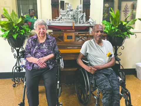 LA REINE ET LE ROI ENJOYED REIGN - Heritage Manor’s king and queen of the Cotton Festival, Le Roi Clanis Freeman (right) and La Reine Mary Sylvia Veillon (left) shared their enjoyment of their reigns. (Gazette photo by Heather Bogard)