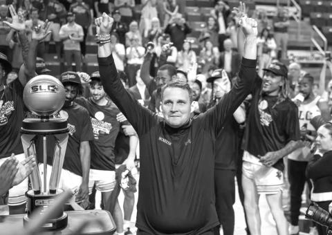 CELEBRATION TIME – McNeese men’s basketball coach Will Wade celebrates after the Cowboys repeated as Southland Conference Tournament champions. McNeese will play Clemson in the first round of the NCAA Tournament. (Photo by McNeese Athletics)