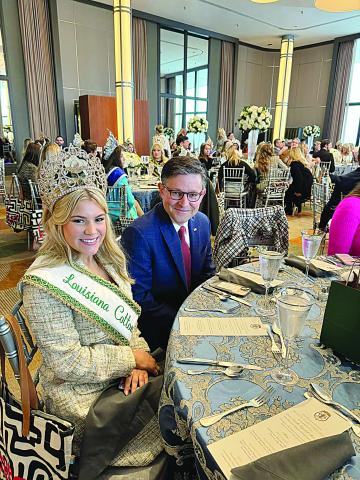 Queen Cotton Amelia Mickal is pictured with Speaker of the House Mike Johnson 