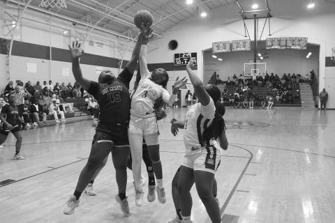 Yazminn Ardoin (3) goes up for a loose basketball in Ville Platte’s win over North Webster in the first round of the Non-Select Division III  playoffs. (Photo courtesy of Nick Jagneaux)