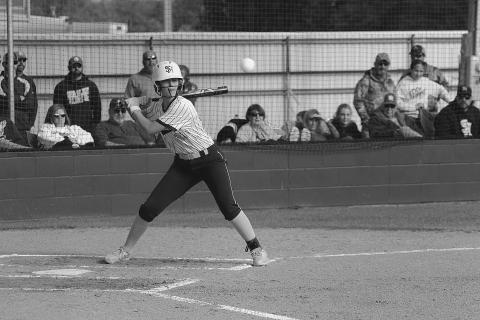 Jodie Landry (23) waits for a pitch to cross home plate in Sacred Heart’s 9-5 loss to Opelousas Catholic on Tuesday afternoon. (Gazette photo by Rhett Manuel)