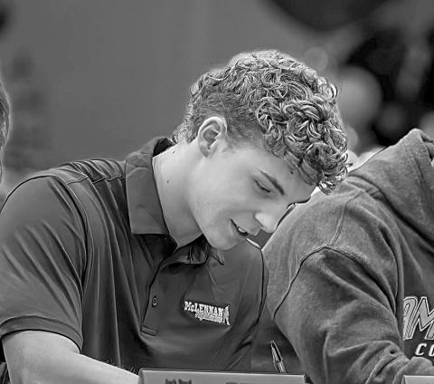 Owen Smith, the son of Gerard and Holly Smith and grandson of Terryl and Barbara Fontenot, is pictured as he signs with McLennan College. (Photo courtesy of Gerard Smith)
