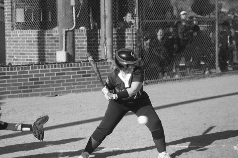Lady Bulldog Kaislyn Lafleur (21) watches a pitch cross home plate in a district loss to Pine Prairie. (Gazette photo by Rhett Manuel)