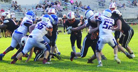 Elijah George (2) finds a running lane for his Pine Prairie Panthers as the team played Lake Arthur in a scrimmage Thursday night. He scored a pair of touchdowns in the Panthers’ 14-13 win during the scored portion. (Gazette photo by Rhett Manuel)