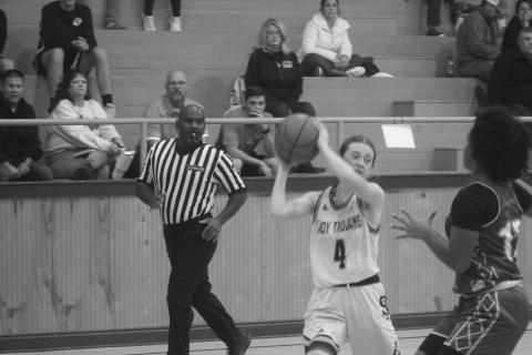 Averie Pitre (4) looks to pass the basketball to a teammate in Sacred Heart’s 59-28 win over Mamou.