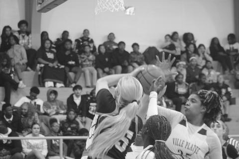 Ville Platte’s Toni Falkenberry (35) attempts to block a shot from Pine Prairie’s Jolie West (15)