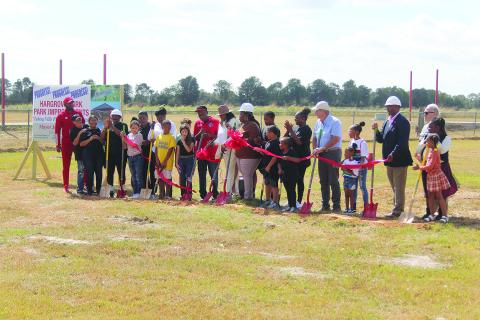 Pictured are the community members and city officials who gathered for the groundbreaking at Hargrove Park. Among those are Mayor Jennifer Vidrine; City Councilmembers Bryant Riggs, Jordan Anderson, Christina Sam, Mike Perron, and Jerry Joseph; and City Engineer Ronnie Landreneau. (Gazette photo by Tony Marks)