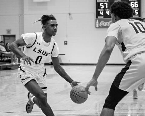 Former Pine Prairie stand out Isaiah Payne takes the basketball down the court for the LSUE Bengal basketball team in a game played earlier this season. (Photo courtesy of Travis Webb/ LSU Eunice)