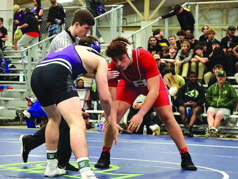 Bearcat Romyn Cortez (right) takes on Aidan Angrisano from Dutchtown in the finals at the La. Public Schools State Championships.