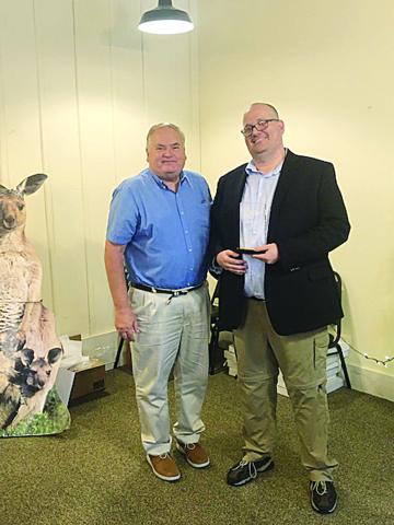 Raymond Partsch III was named Sportswriter of the Year at the Louisiana Sports Writers Association Awards Luncheon held Sunday, June 27, at Merci Beaucoup in Natchitoches. He is pictured on the right as he receives the award from LSWA member Sheldon Mickles. (LSN photo by Tony Marks)