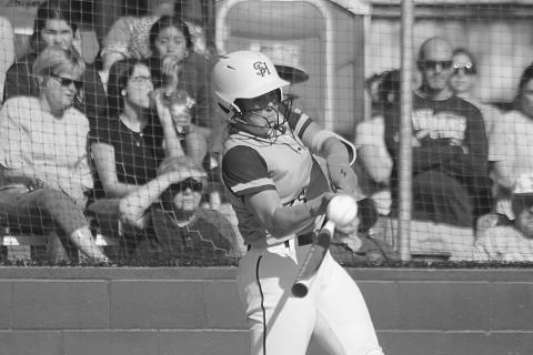 Jolie Vidrine (25) connects with a pitch in Sacred Heart’s playoff opening win against Covenant Christian. (Gazette photo by Rhett Manuel)