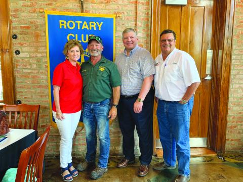 BUTLERS VISIT ROTARY -  Representative Rhonda Butler, left, was the guest speaker for the June 29, meeting of the Ville Platte Rotary Club. Her husband, Frank Butler, also shared an update on his tree service. They are shown with, third from left, Rotary President Peter Strawitz and Rotarian Mitch Fontenot. (Gazette photo by Heather Bogard)