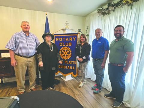HISTORY OF LOUISIANA ORPHAN TRAIN SHARED - Shown, from left, are Rotarian Peter Strawitz, Laine LaTour, Martha Aubert (president of the Louisiana Orphan Train Museum in Opelousas), museum board member James Douget and Rotary President Beau Wilson. LaTour, Aubert and Douget spoke about their work with and connection to the Louisiana Orphan Train riders that came from New York City to Opelousas. (Gazette photo by Heather Bogard)