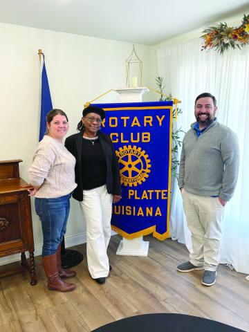 FRENCH IMMERSION DISCUSSED - French Immersion Coordinator Madame Louise Tini (center), gave an update on the program during the Tuesday, November 11, meeting of the Ville Platte Rotary Club. She is shown with Rotarian Kristie Enicke (left) and Rotary President Beau Wilson (right). (Gazette photo by Tony Marks)