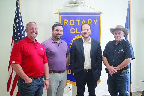 Pictured from left are David Domingue, senior sales representative of LUS Fiber; Rotarian Beau Wilson; Scott Prather, public relations manager of LUS Fiber; and Rotary President Bob Manuel. (Gazette photo by Tony Marks)