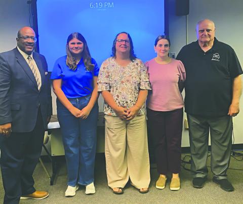 SACRED HEART HIGH SCHOOL 4-H - Shown, from left, are Superintendent Darwan Lazard, Sacred Heart High School 4-H student Amelia Fontenot, 4-H agents Kim Deville and Madison LaTour, and EP School Board President Bobby Hamlin. (Gazette photo by Heather Bogard)