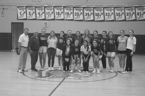 Last year’s Sacred Heart girls’ basketball team was honored prior to a scrimmage on Thursday, November 7. Pictured in no particular order are head coach Shane Darbonne, former head coach Craig Whittington, Bre Ardoin, Laura Prudhomme, Averie Pitre, Josie Vidrine, Mary Perron, Alyssa Brignac, Caroline Richardson, Jolie Vidrine, Rose Ardoin, Taylor Darbonne, Jodie Landry, Ava Johnson, Olivia Tate, Emily Ardoin, and Katherine Fontenot. Not pictured is Kali Shiver. Gazette photo by Tony Marks  