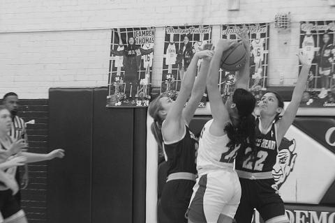 Mamou’s Madison Fontenot (22) attempts a basket against Sacred Heart. (Gazette photo by Rhett Manuel)