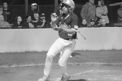 Isaac Perry (22) claps his hands after crossing the plate for Sacred Heart’s first run in a 6-2 win against Pine Prairie on Tuesday, March 5. (Gazette photo by Tony Marks)