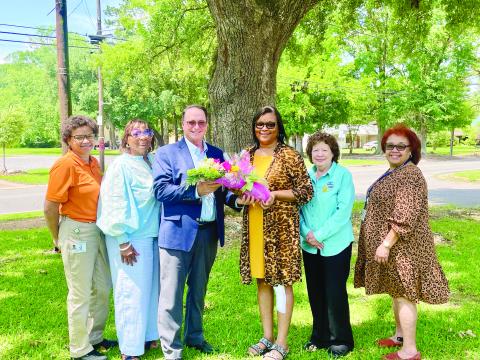 Pictured from left to right: Superintendent’s secretary Angelia Arvie, Teacher Quality Supervisor Grace Vidrine Sibley, Assistant Superintendent Mike Lombas, Honoree Pauline Toussaint, Title I Director Maryann Fontenot, and Support Personnel Coordinator Sherral Tezeno. (Photo by Tone Tezeno)