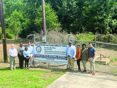Pictured from left, at the site of the sewer lift station on West Main Street, are City Engineer Ronnie Landreneau, Christine Williams and Staresha Hoskins from Delta Regional Authority, City Clerk/ Treasurer Donald Bergeron, Mayor Ryan LeDay Williams, City Councilwomen Anna Frank and Christina Sam, and Kade Jones from Acadiana Planning Commission. (Gazette photo by Tony Marks)