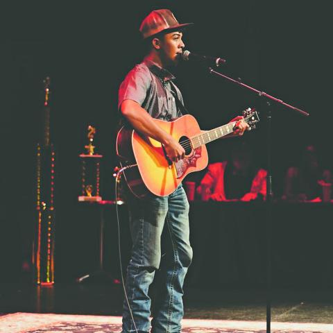 Mamou native Shaun Young takes the stage during the Lafayette Idol competition. (Photo courtesy of Adrian Allen)
