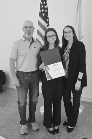 Charlee Smith (center) is shown with her parents Chris and Krystle Smith at the CYLA awards program in Baton Rouge.
