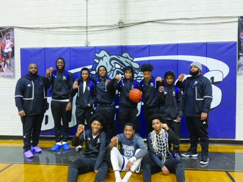 Pictured with their coaches are members of the Ville Platte High boys’ basketball team that won the District 5-3A championship. In no particular order are Davonte Fontenot, Jaquan Lavergne, Jamarre Byers, Tauj Roy, Montavius Seraille, Taylin Richard, Jakhalan Slaughter, Troas Murray, Latelldrick Prejean, Sage Papillion, Michael Berry, and Latrayvion Thomas. (Photo courtesy of VPHS)