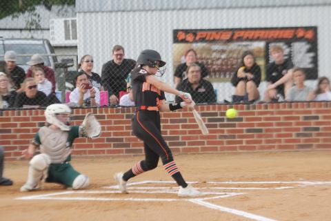 Sydney Fontenot (20) connects with a pitch in a Pine Prairie Lady Panther game against Mamou. (Gazette photo by Rhett Manuel)